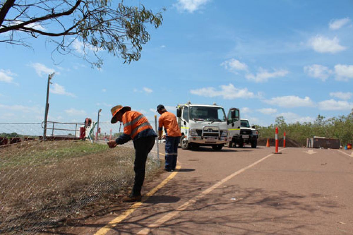 Workers on the side of the road