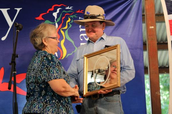 Mayor being handed an award