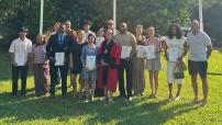 All new Australian Citizens pose with the mayor of Litchfield, Rachael Wright